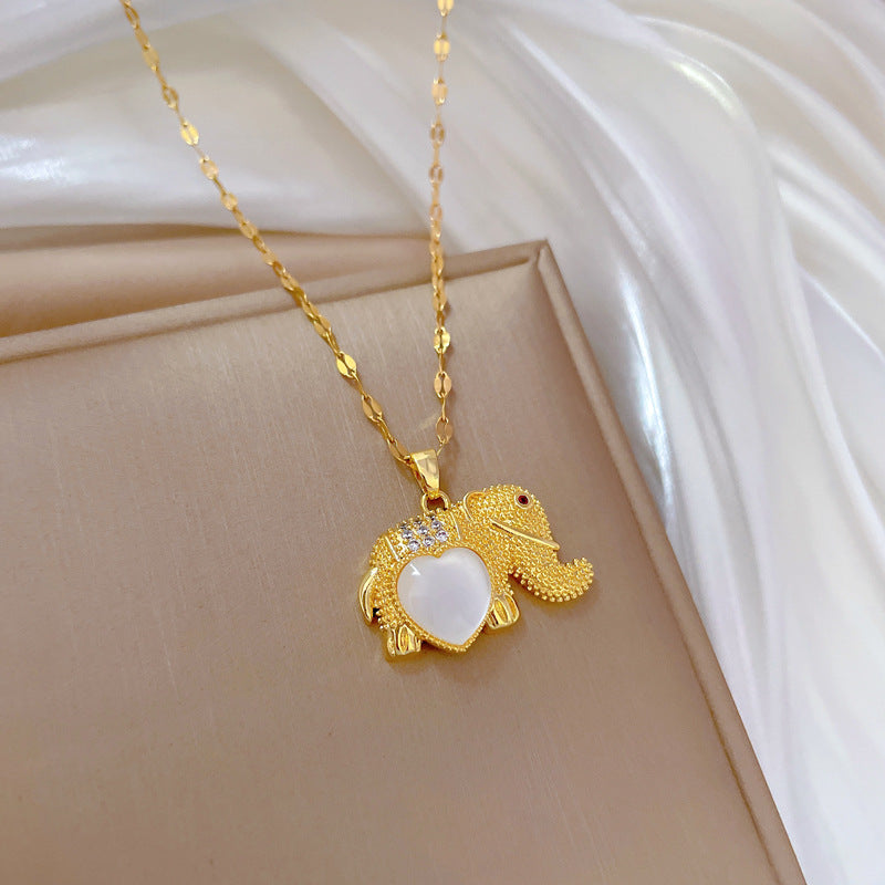 Elegant Elephant Pendant Necklace for Women with Cat's Eye Stone Inlay on Titanium Steel Chain, Geometric Design, Minimalist and Fresh Style