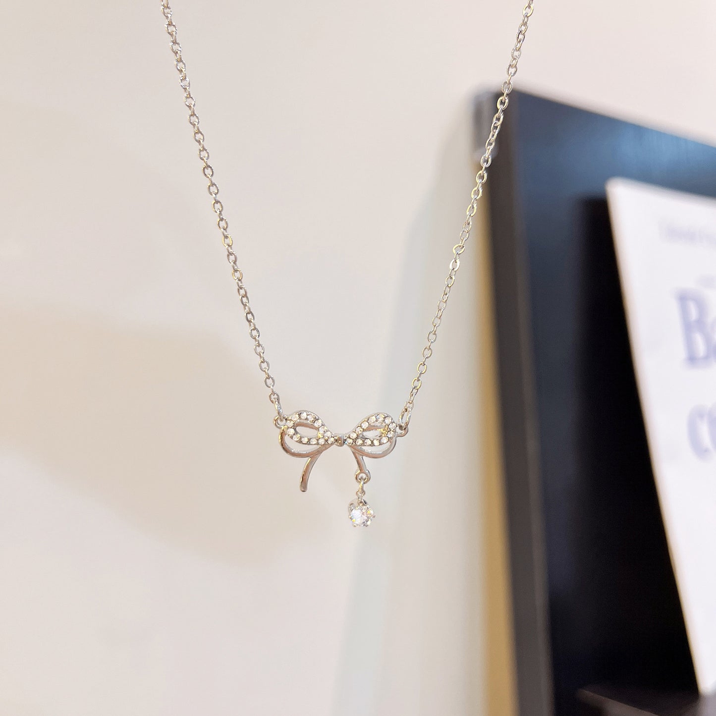 Bow-shaped Zirconia Clavicle Necklace for Women in Titanium Steel with Inlay Craftsmanship, Minimalist and Elegant Design