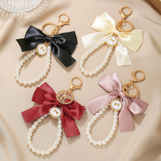 Sweet Cartoon Bow Pearl Zinc Alloy Keychain Bag Charm
