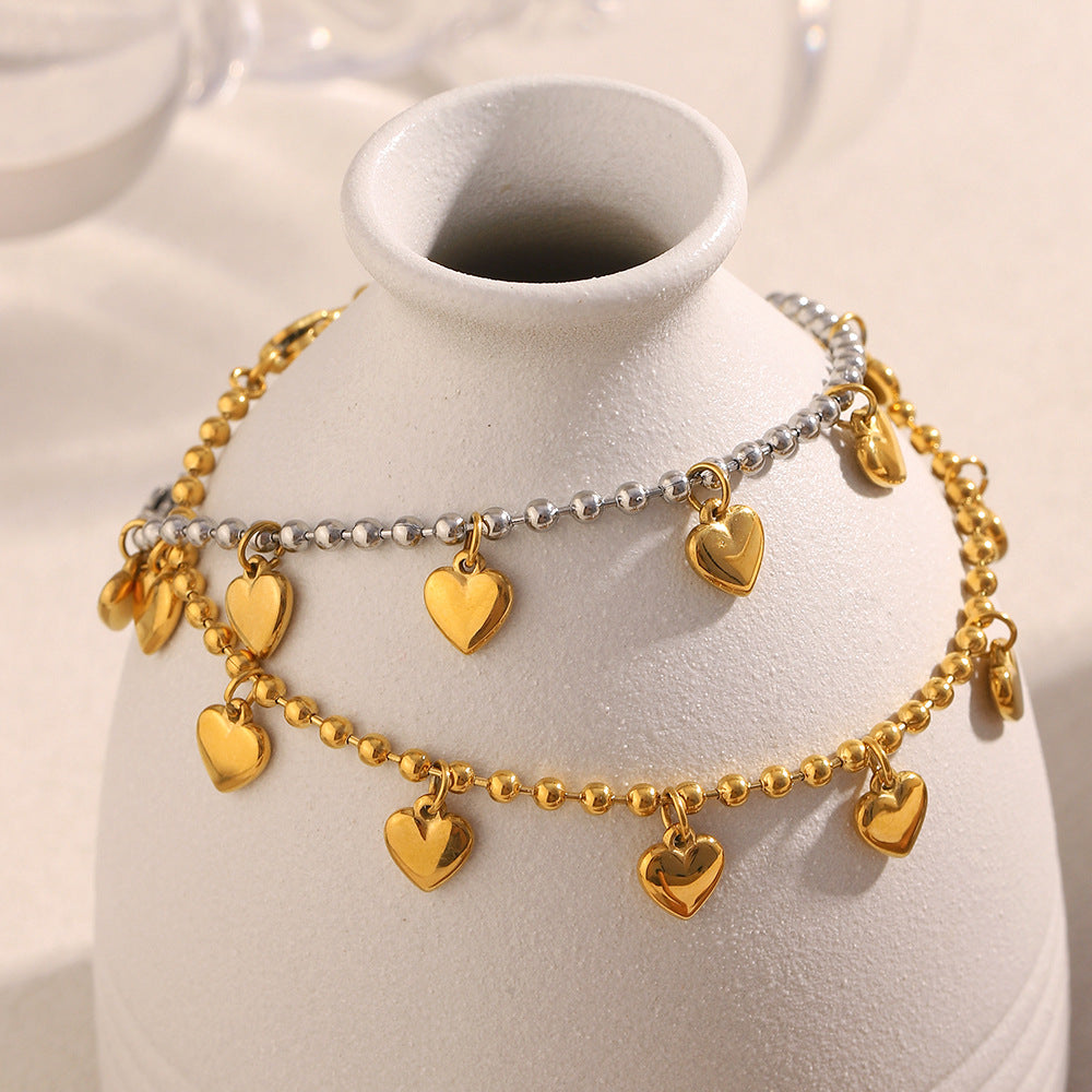 Elegante bracciale con perline a forma di cuore minimalista in acciaio inossidabile placcato oro 18 carati da donna