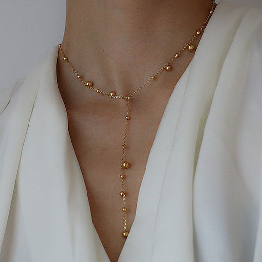 Collar Colgante Minimalista de Acero de Titanio con Acentos de Borlas para Mujer, Cadena Larga tipo O con Acabado Chapado