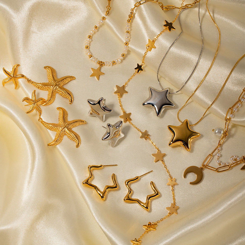Orecchini minimalisti in acciaio inossidabile a forma di stella con placcatura in oro, design a cerchio sicuro per le donne