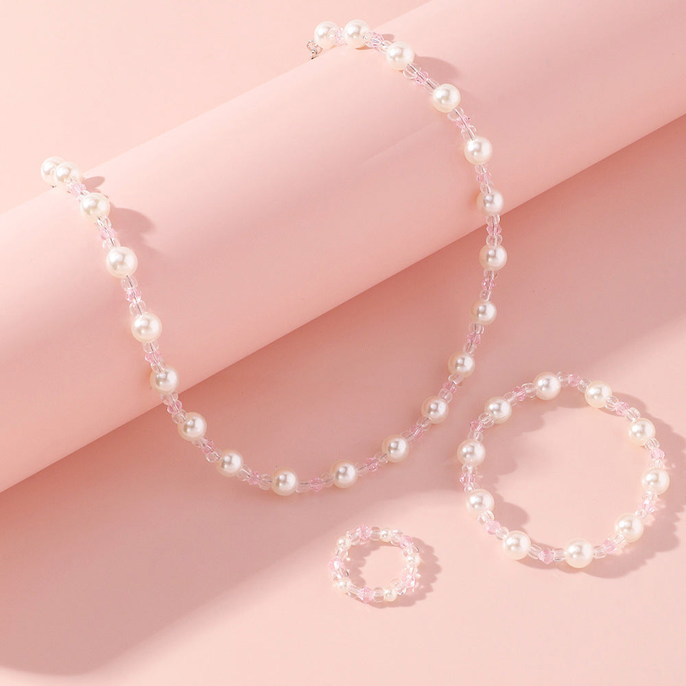 Juego de collar y pulsera de perlas con diseño de dibujos animados para niñas con cuentas de cristal transparente en un dulce y fresco diseño