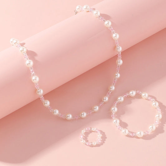 Set Collana e Braccialetto con Perle e Perline in Stile Cartone Animato per Bambine, con Perline di Cristallo Trasparente in un Design Dolce e Fresco