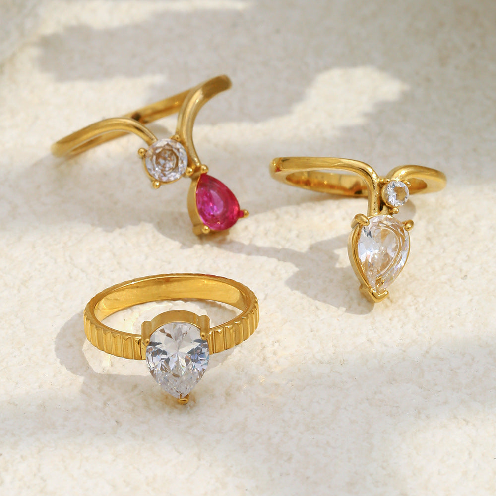Anillo minimalista de acero inoxidable con chapa de oro de 18k, diseño geométrico y circonitas en forma de lágrima