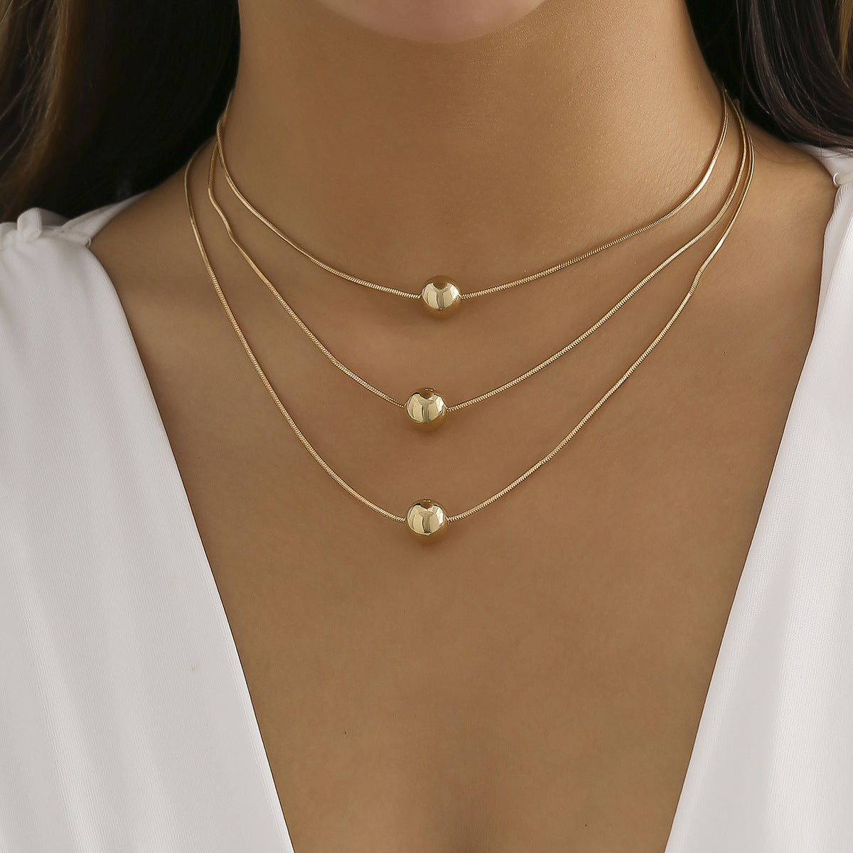 Collana pendente geometrica stile punk da donna con catena a serpente multistrato e struttura in metallo
