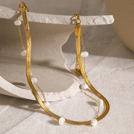 Tobillera de mujer de acero inoxidable chapado en oro de 18 quilates, estilo francés, cadena de serpiente plana con cuentas redondas de concha
