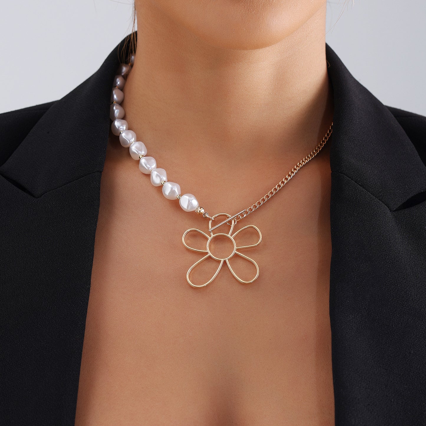 Geometric Hollow Flower Pendant Necklace for Women with Electroplated Metal Chain and Imitation Pearl Beads