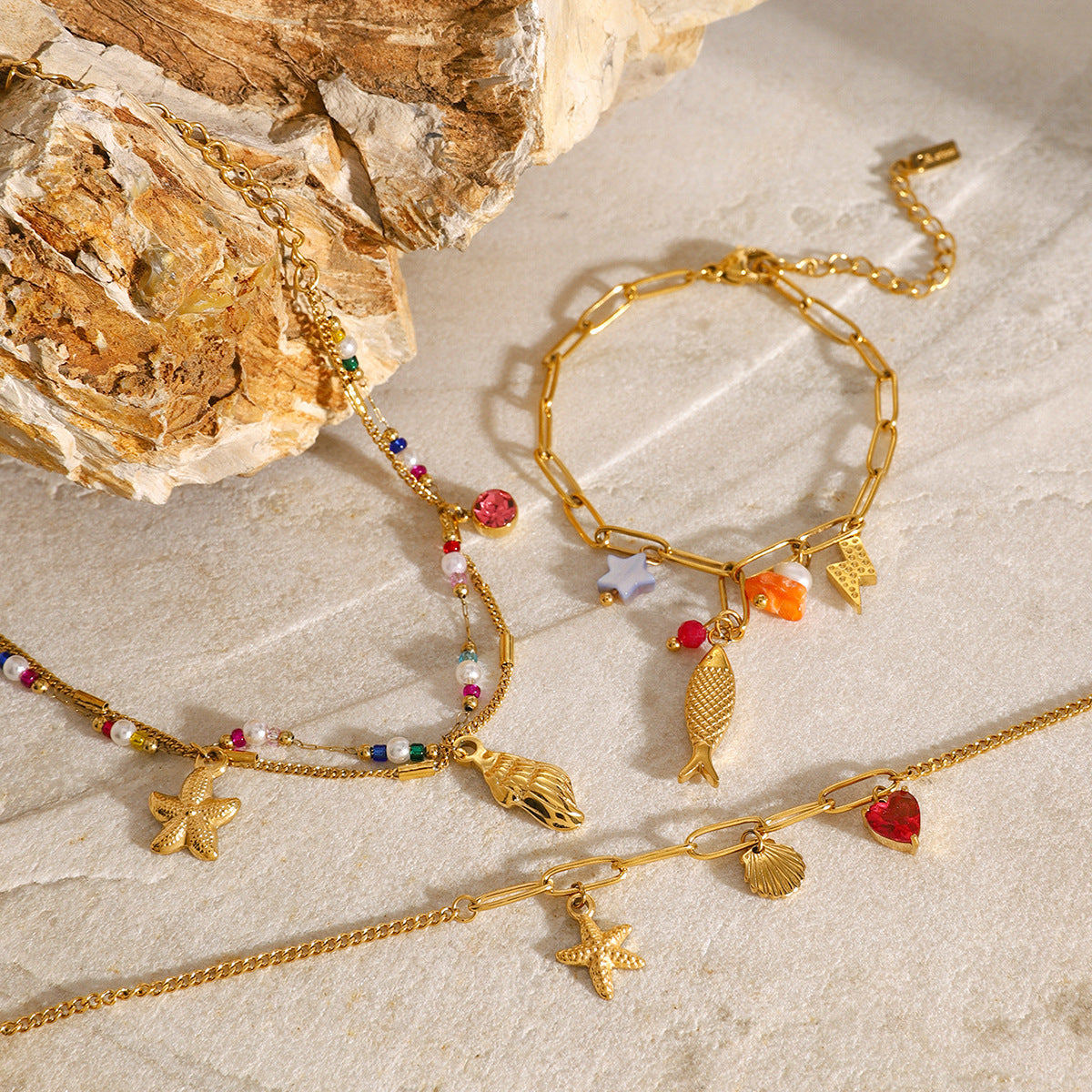 Bracciale da donna con ciondolo a barra in acciaio al titanio placcato oro 18 carati a forma di animale geometrico