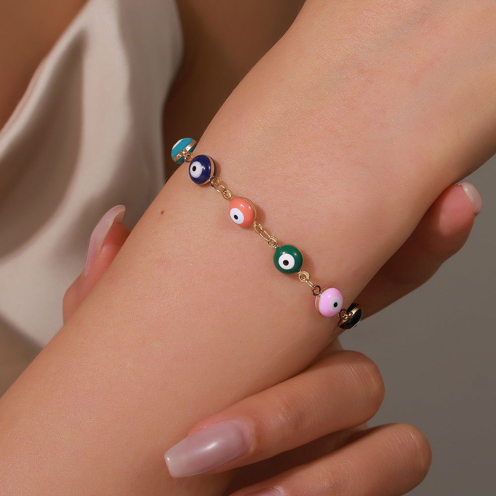 Cavigliera e braccialetto in acciaio inossidabile in stile bohémien colorato con occhio di Allah e motivi geometrici e a cuore