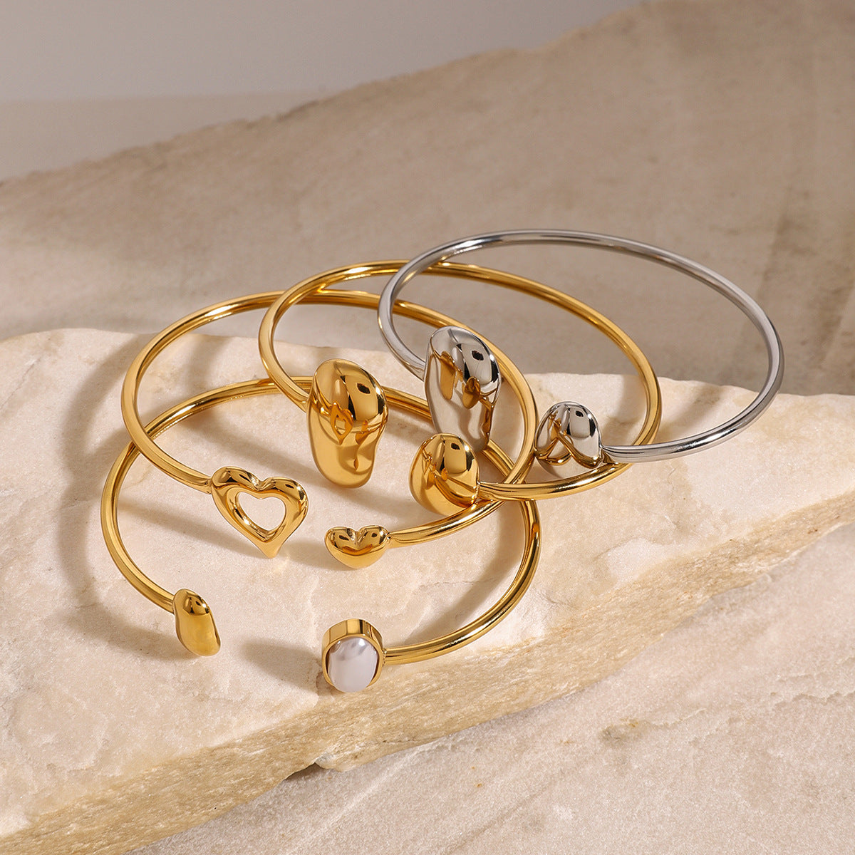 Set di bracciale e orecchini a goccia in acciaio inossidabile asimmetrico e minimalista con finitura placcata