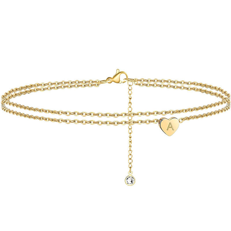 Cavigliera da Donna Minimalista in Acciaio al Titanio a Cuore Geometrico Placcata Oro 18K