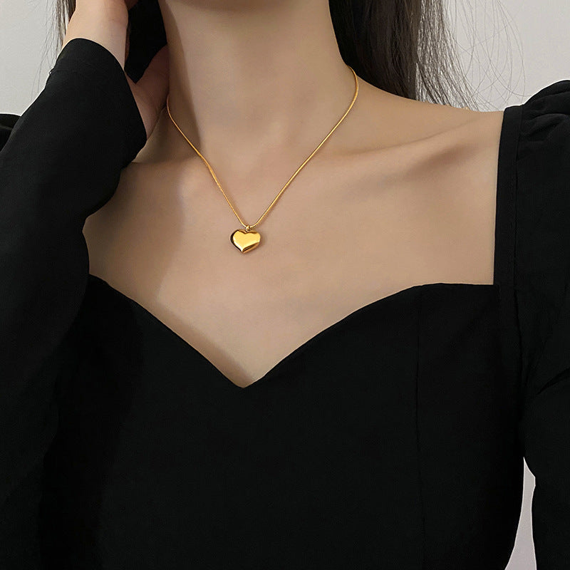 Minimalist Heart-Shaped Titanium Steel Necklace with Cross Chain Design for Women