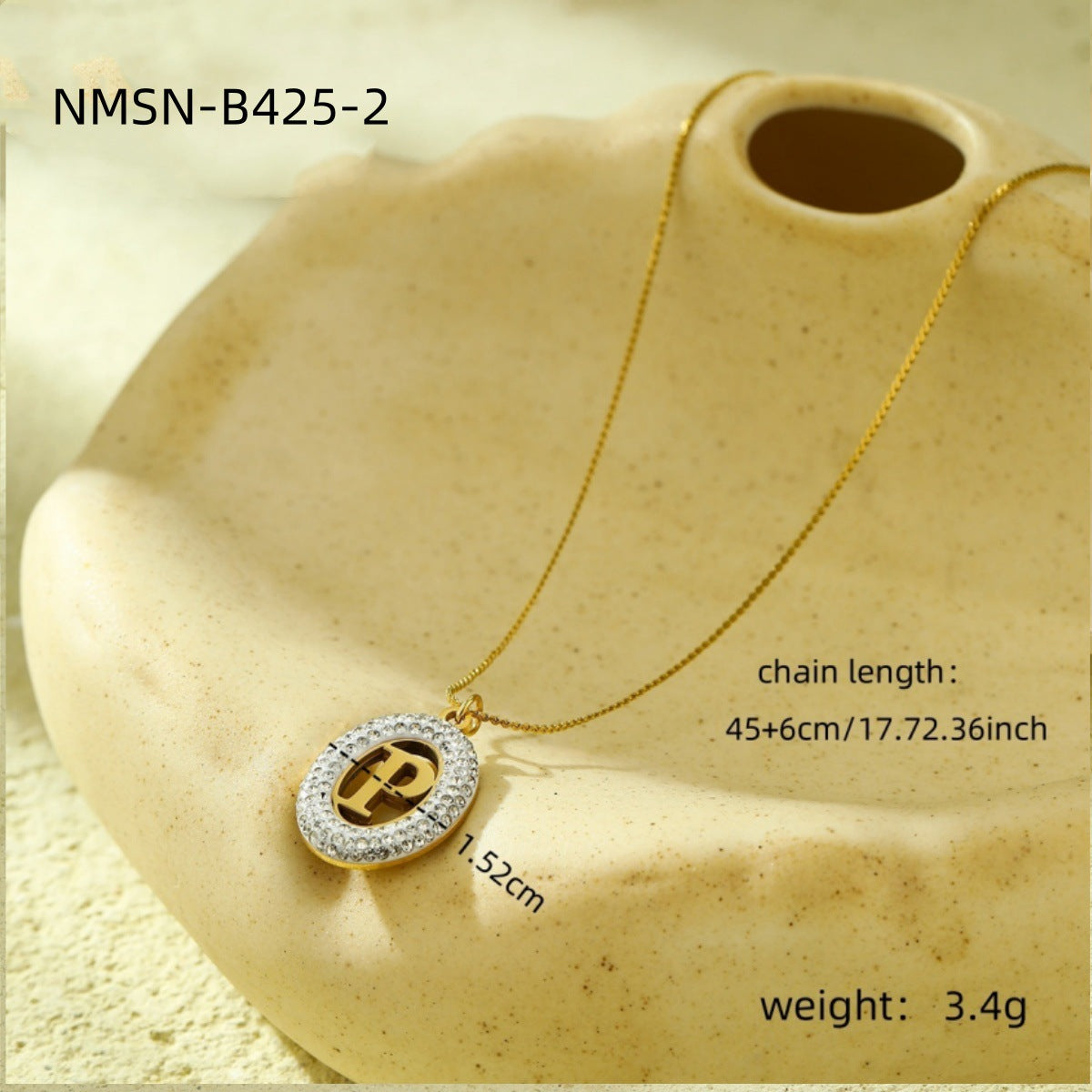 Collana da donna alla moda con ciondolo ovale in acciaio inossidabile con intarsio in zircone e lettera traforata