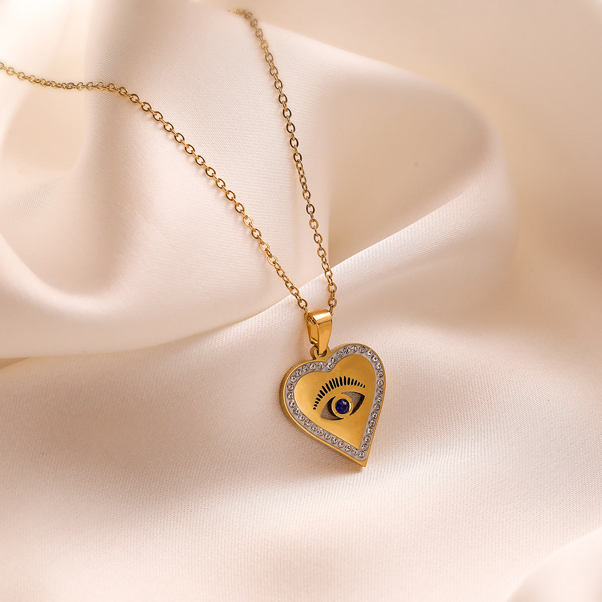 Collana con Pendente a Cuore Minimalista in Acciaio al Titanio con Intarsio di Zirconi da Donna