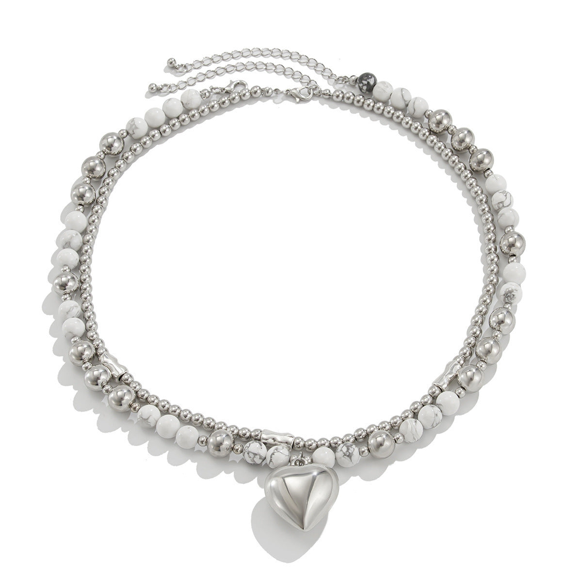 Collana con ciondolo a cuore minimalista con ciondolo in lega placcata e delicata catena per clavicola