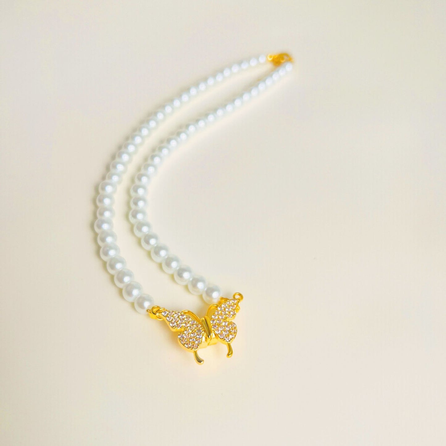Minimalist Butterfly-Shaped Titanium Steel Necklace with Imitation Pearl Pendant, Magnetic Clasp, Electroplated Finish, Unisex Luxury Accessory