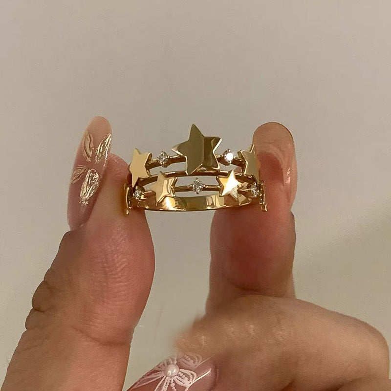Anillo abierto de lujo francés retro con forma de estrella para mujer con incrustaciones de circonita cúbica en cobre