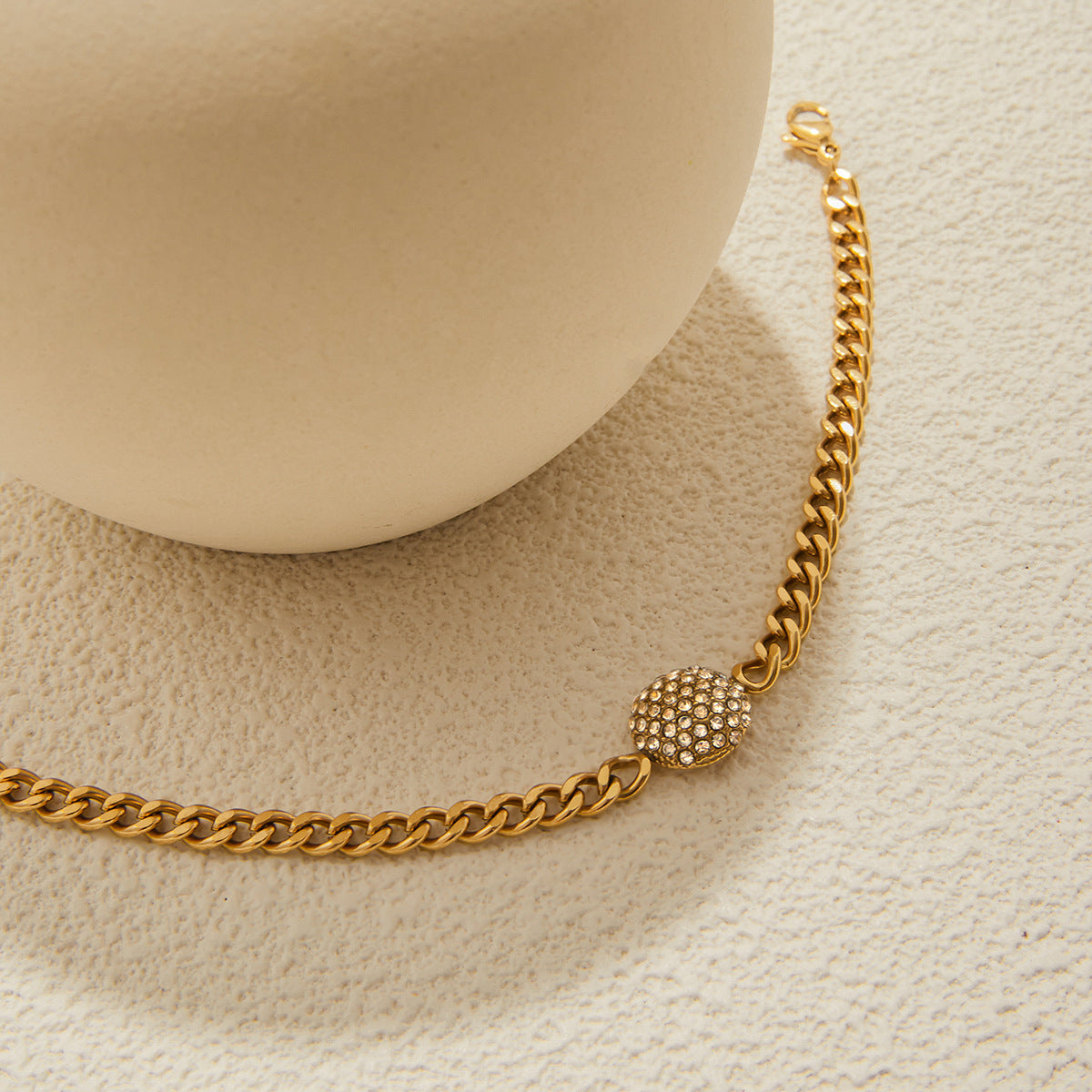 Pulsera geométrica de acero inoxidable chapado con circonita blanca y turquesa para mujer. Joyería minimalista de lujo.