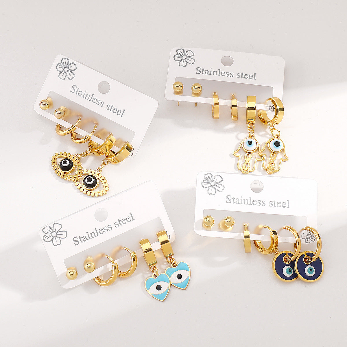 Pendientes de puño minimalistas de acero inoxidable con acabado de esmalte y diseño de ojo para mujer