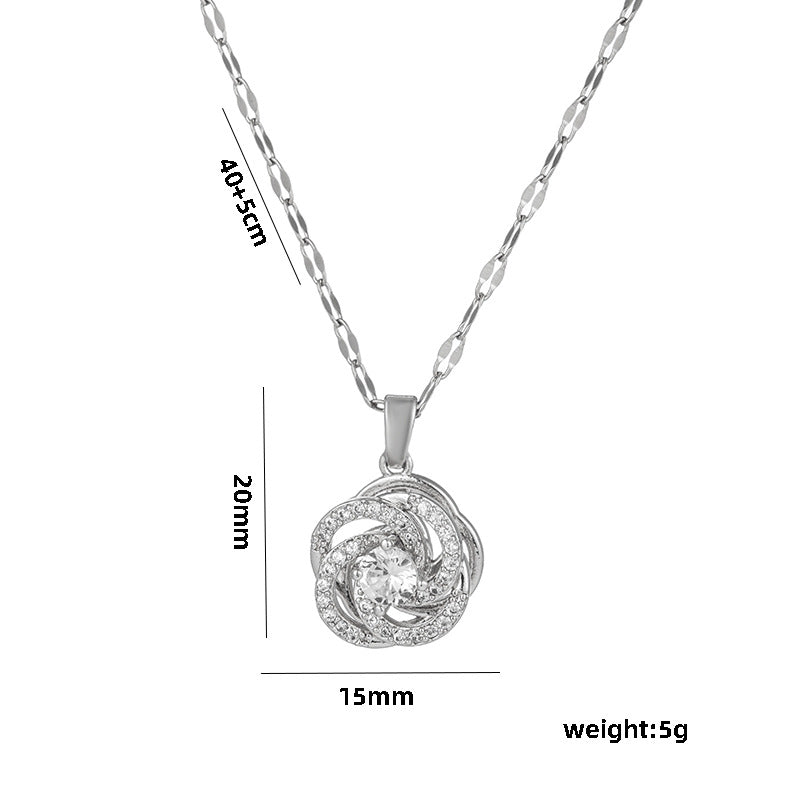 Light Luxury Geometric Camellia Pendant Necklace for Women with Rotating Zirconia Accents in Titanium Steel with Water Wave Chain