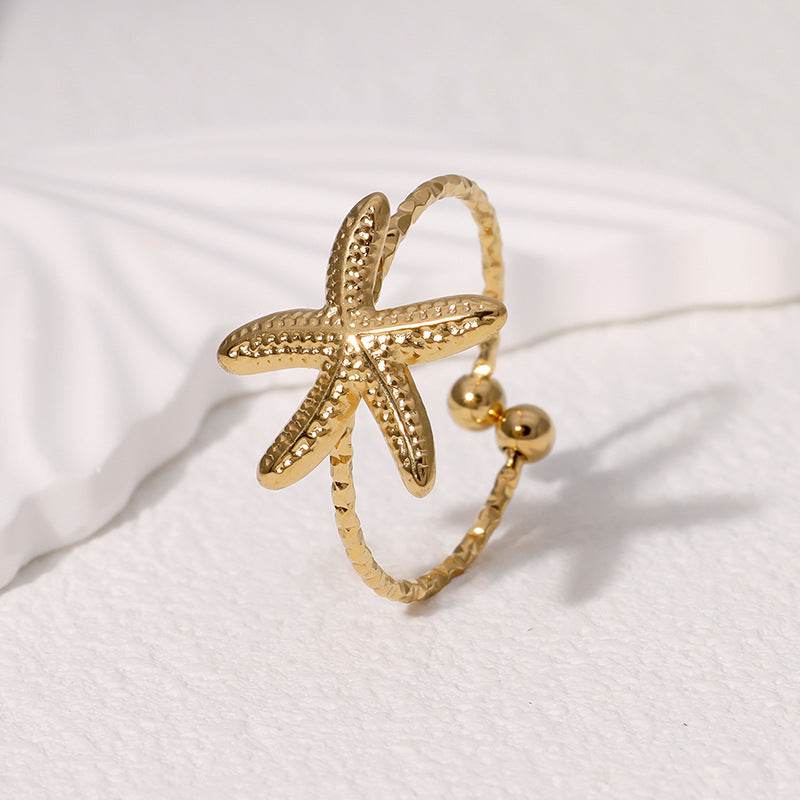 Anello aperto a stella marina minimalista in acciaio inossidabile da donna con finitura placcata