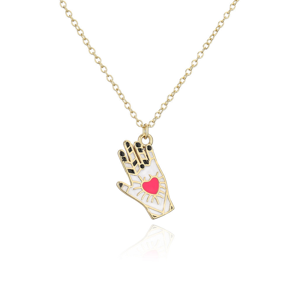 Minimalist Hand-Shaped Pendant Necklace in Copper with 18K Gold Plating and Enamel Detail