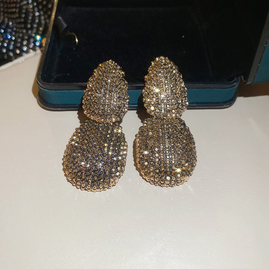 Orecchini a perno ovali geometrici vintage in lega con intarsio di strass da donna