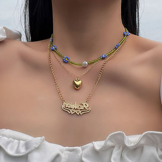 Sweet and Edgy Daisy Letter Multi-Layer Necklace in Alloy with Electroplated Finish, Resin Beads, Geometric Pendant, Fresh Floral Style for Women