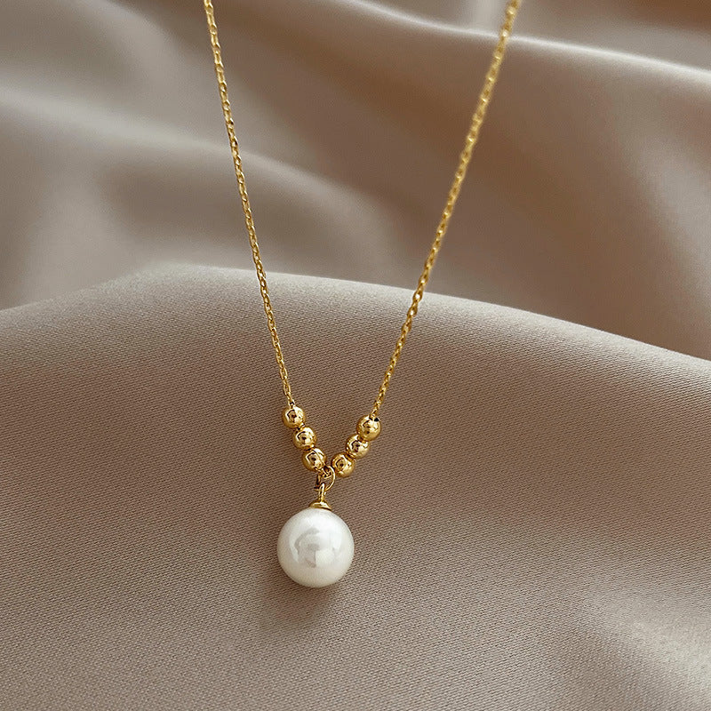 Minimalist Cold-Tone Bean-Shaped Freshwater Pearl Necklace for Women with Titanium Steel Pendant and Plated Finish on Clavicle Chain