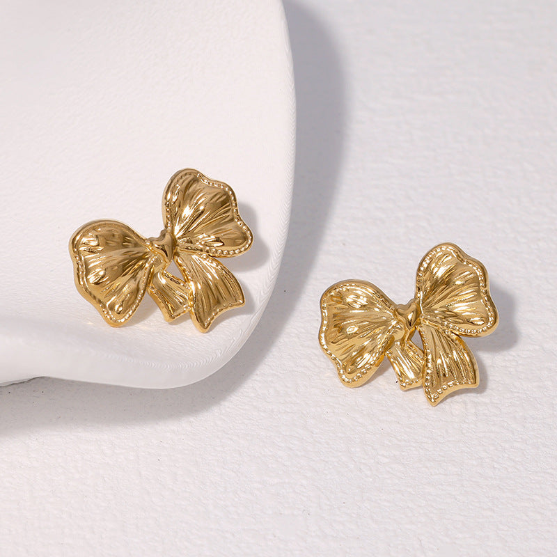 Pendientes minimalistas de acero inoxidable con forma de lazo y acabado chapado para mujer