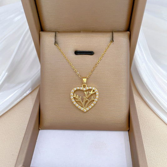 Collar con colgante minimalista de corazón y cuernos de acero inoxidable con detalles de diamantes de imitación para mujer y hombre
