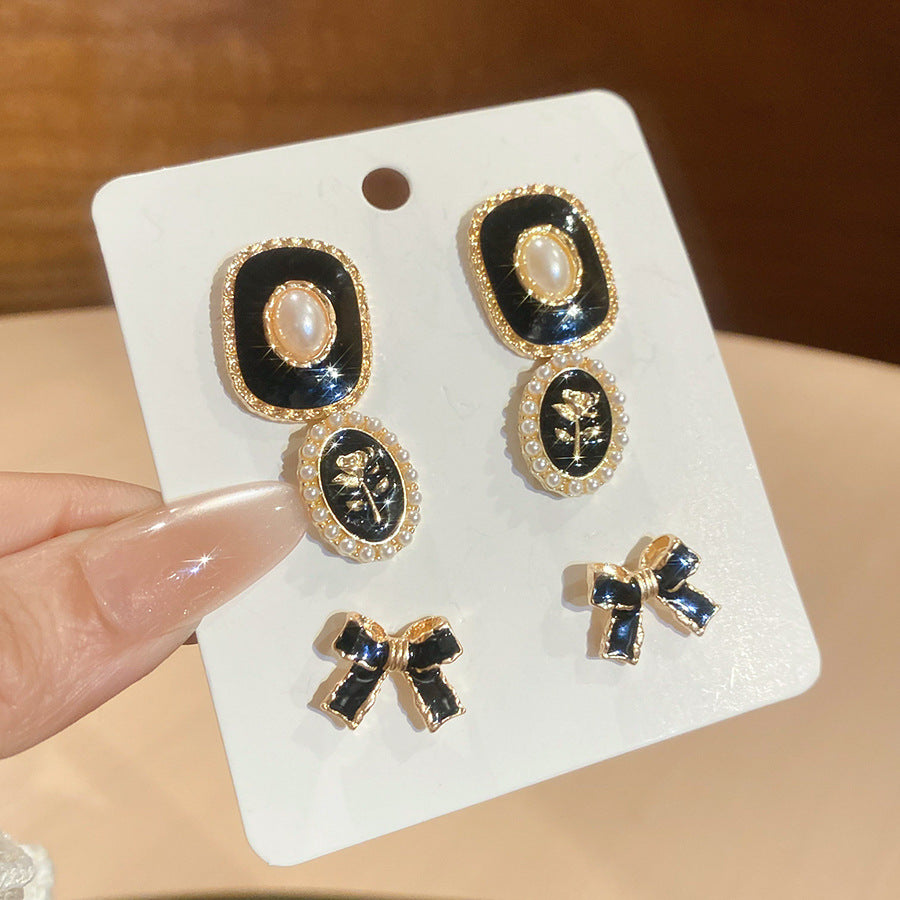Orecchini a perno eleganti retrò a forma di fiocco con intarsio di strass e perni in acciaio per donna