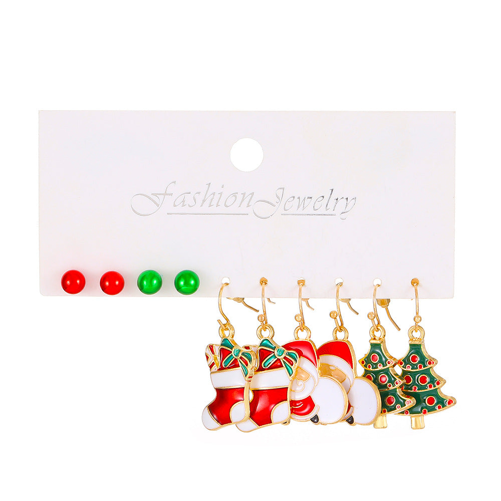 Juego de pendientes de aleación con temática navideña para mujer con dijes esmaltados de ciervo y Papá Noel, diseño geométrico, acabado chapado