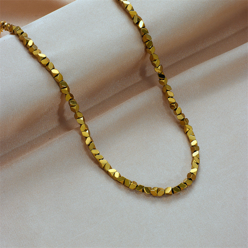 Minimalist Geometric Faceted Titanium Steel Pendant Necklace with Handwoven Chain in Gold Plated Finish