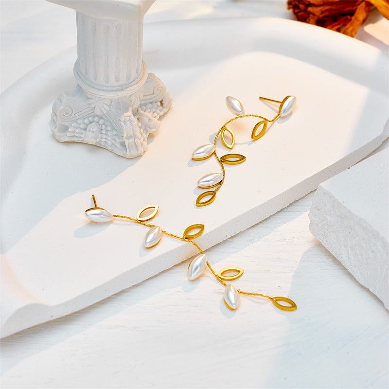 Minimalist Elegant Pearl-Embellished Hollow Leaf Dangle Stud Earrings in Titanium Steel with Plated Finish