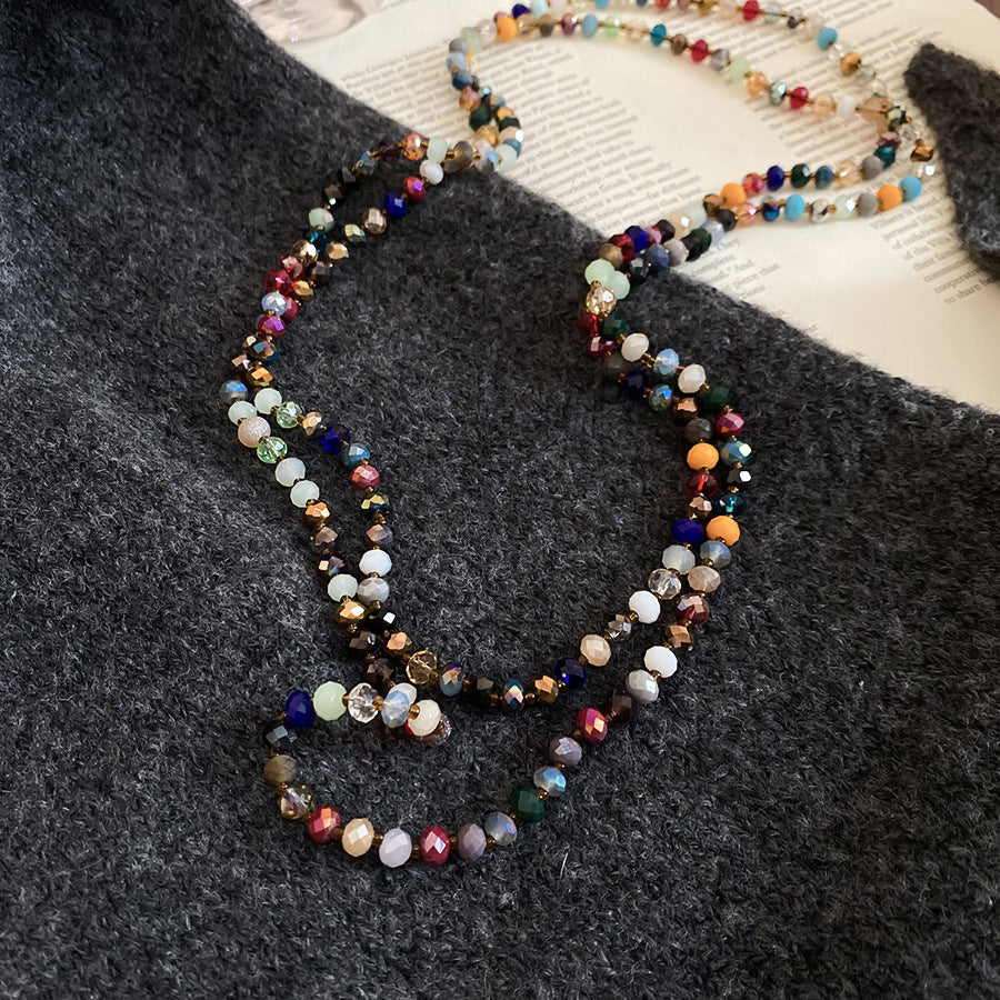 Collana da donna bohémien etnica geometrica con perline e dettagli in cristallo