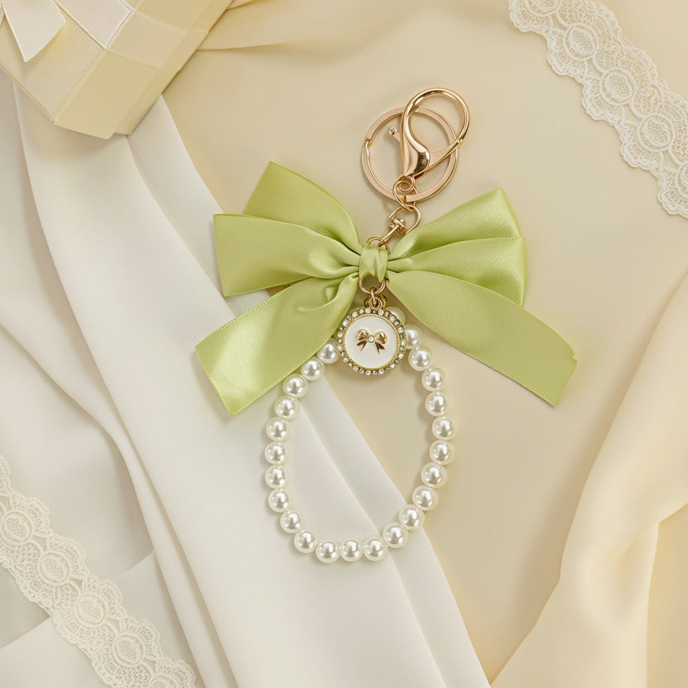Sweet Cartoon Bow Pearl Zinc Alloy Keychain Bag Charm