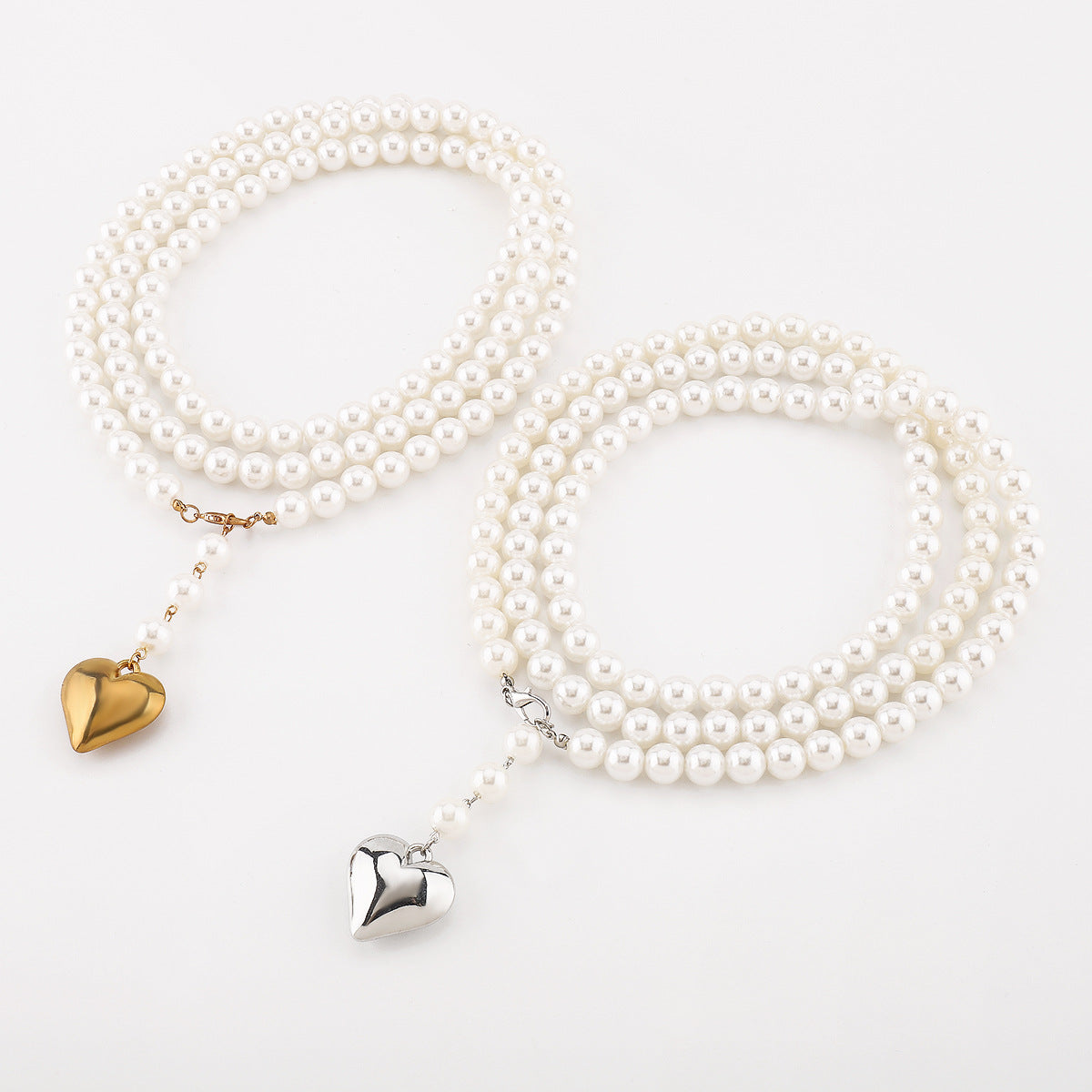 Elegante collar largo de suéter en forma de corazón con perlas y detalles hechos a mano para mujer