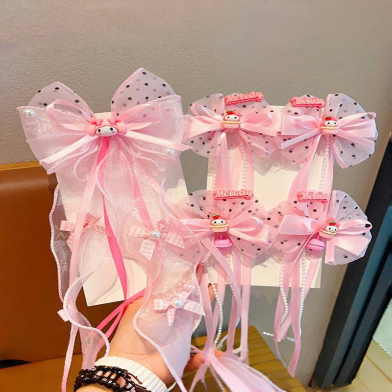 Handmade Chinese Traditional Hair Clip for Girls with Bow Shape Fabric Material and Flowing Tassels in Natural Style