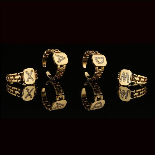 Anillo minimalista de cobre con forma de letra, engaste micro-pavé y banda geométrica ajustable