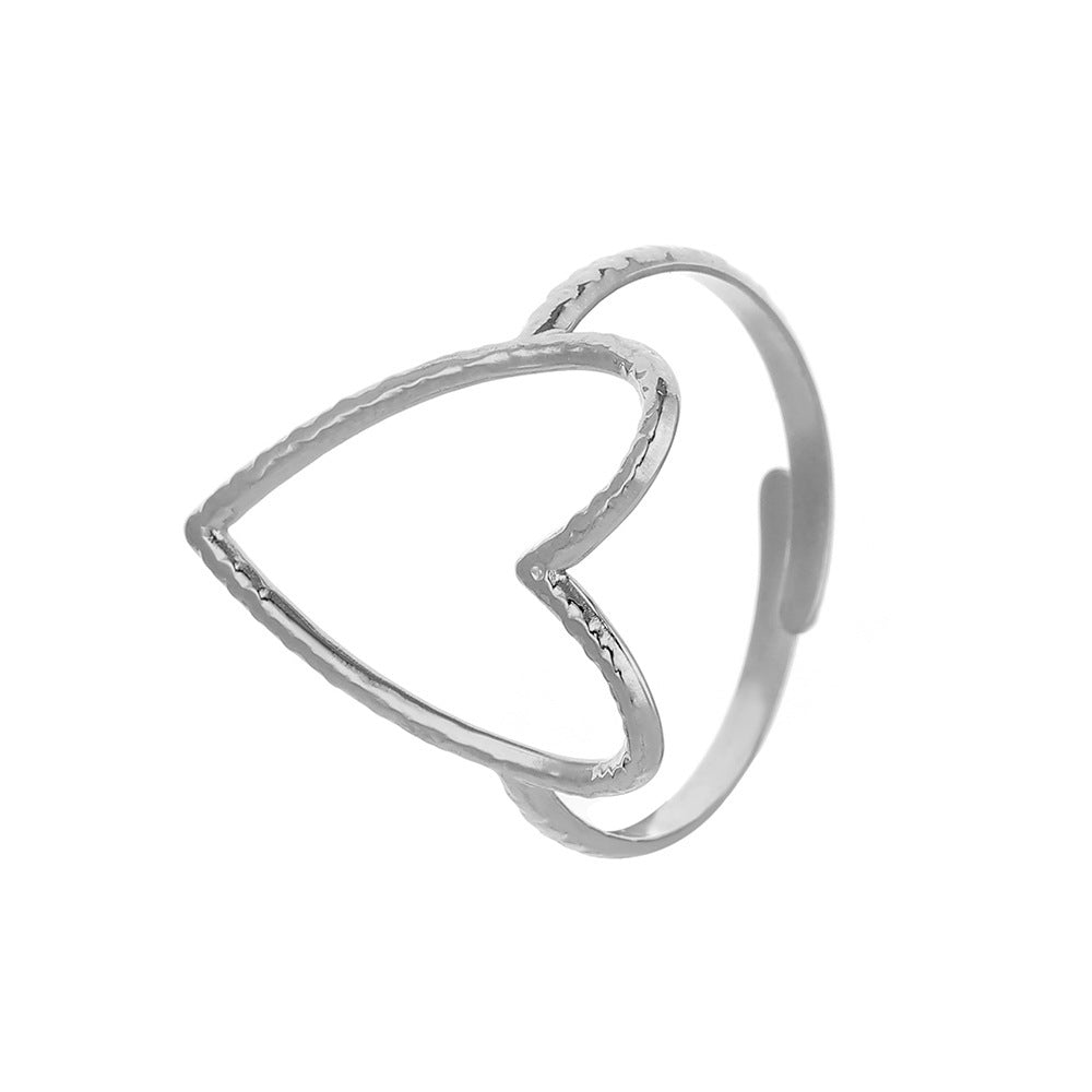 Anello da donna a cuore aperto, in acciaio al titanio, con finitura placcata e design minimalista traforato