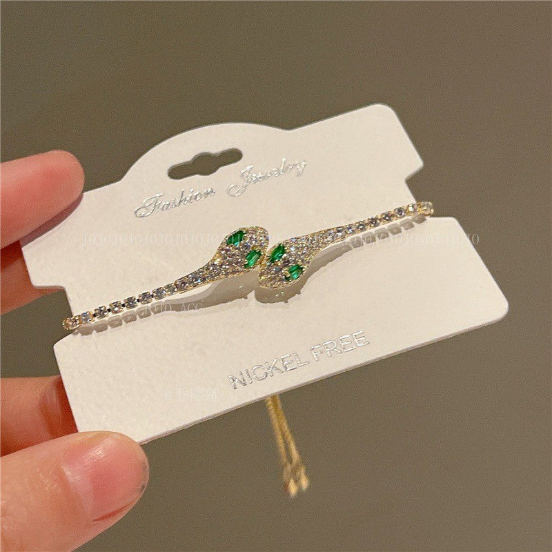 Pulsera de circonita bañada en oro con forma de serpiente para mujer, de estética minimalista de lujo