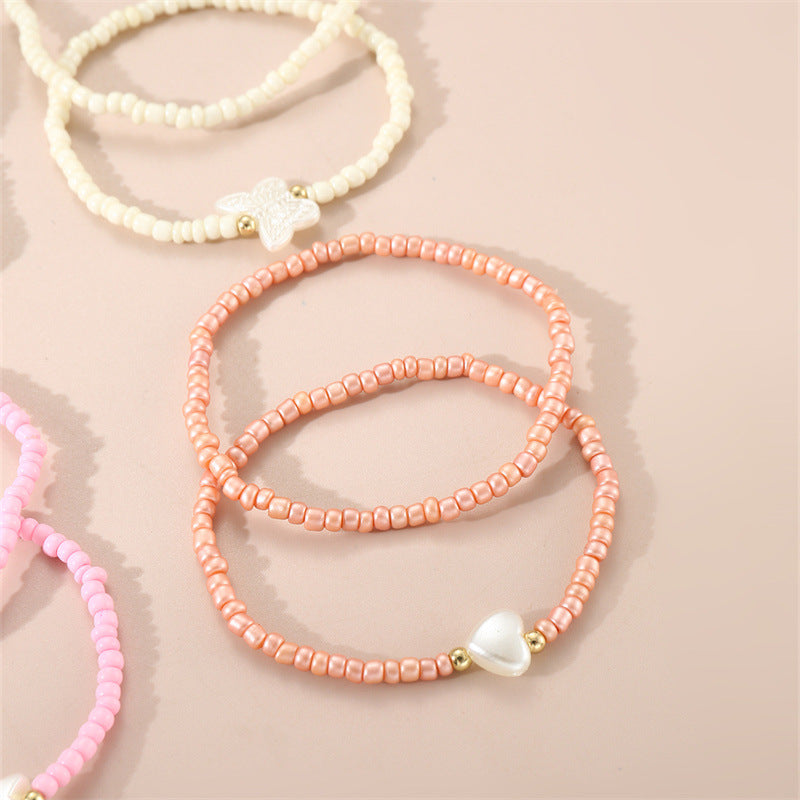 Braccialetto artigianale in stile bohémien con perline per bambini con ciondoli a forma di stella e cuore, perline di vetro colorate