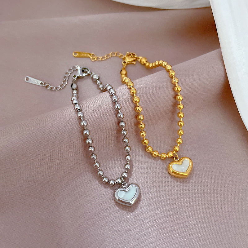 Pulsera de mano bohemia vintage de acero de titanio con corazón, cuentas redondas y ondas para mujer