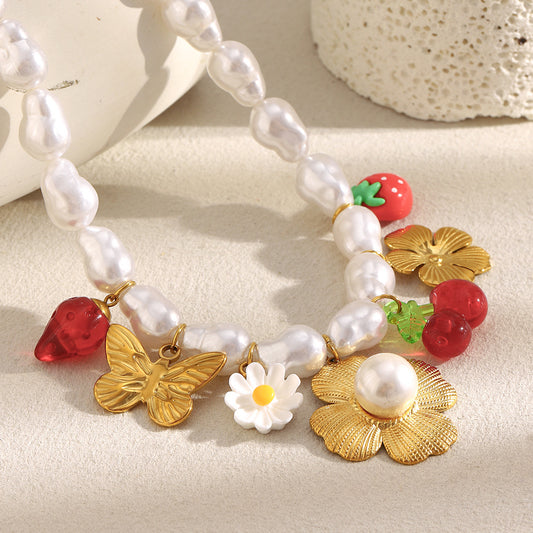 Collar con colgante barroco de mariposa floral para mujer en acero inoxidable con baño de oro de 18 quilates y detalles de perlas de imitación