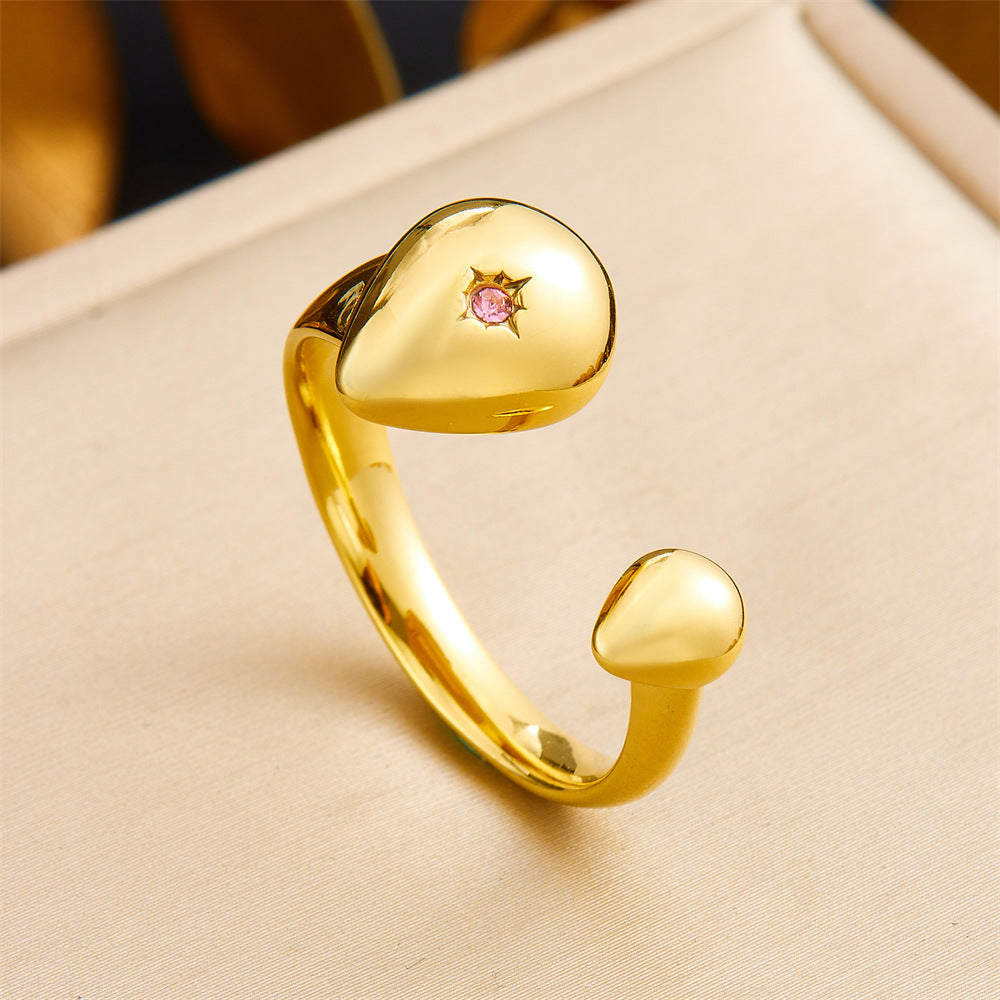 Anillo de acero inoxidable geométrico de estilo vintage con baño de oro de 18 quilates y detalle de corazón asimétrico para mujer