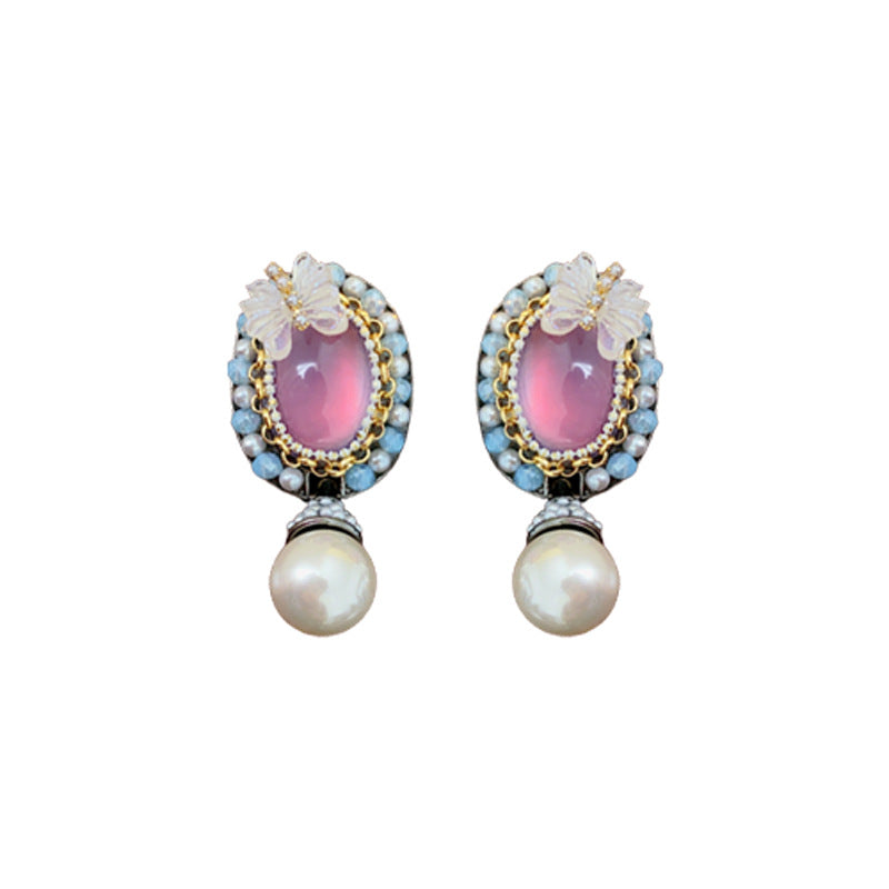 Orecchini a farfalla vintage in resina con cristalli e perle su base in lega placcata argento da donna