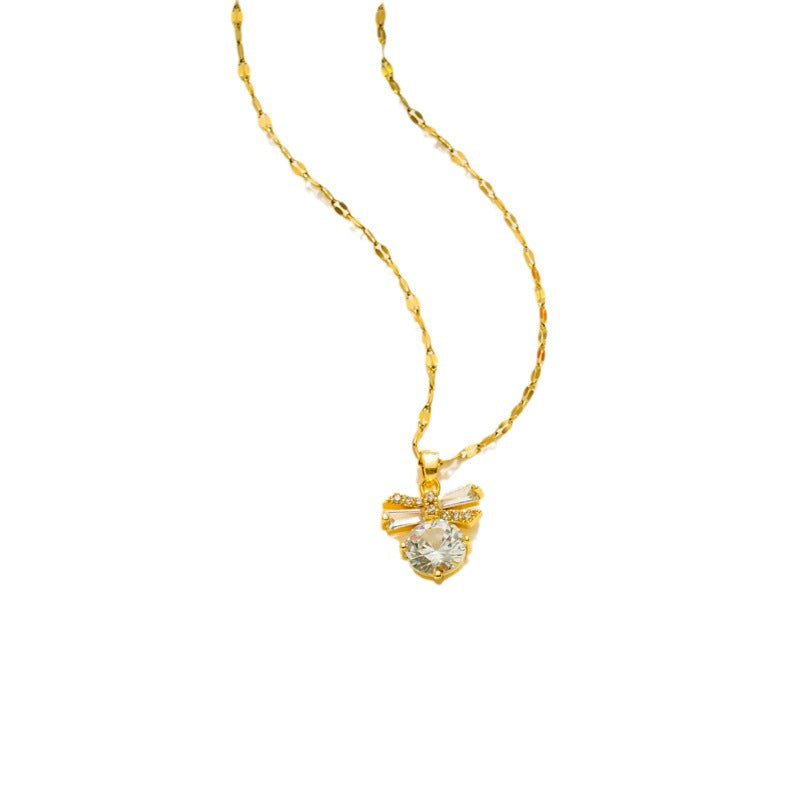 Elegante Collar con Colgante de Lazo para Mujer en Acero Titanio con Incrustaciones de Pedrería y Cadena Ondulada
