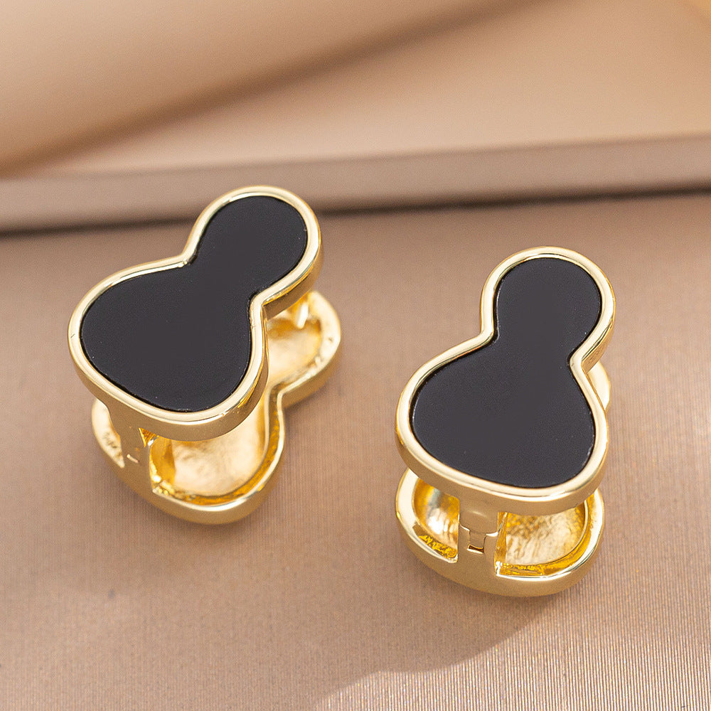 Orecchini a perno Saturno minimalisti color oro in ottone con zirconi per donna